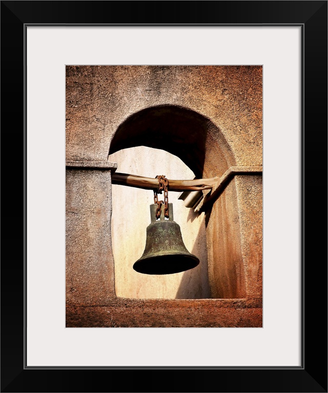 A bell hanging in a tower