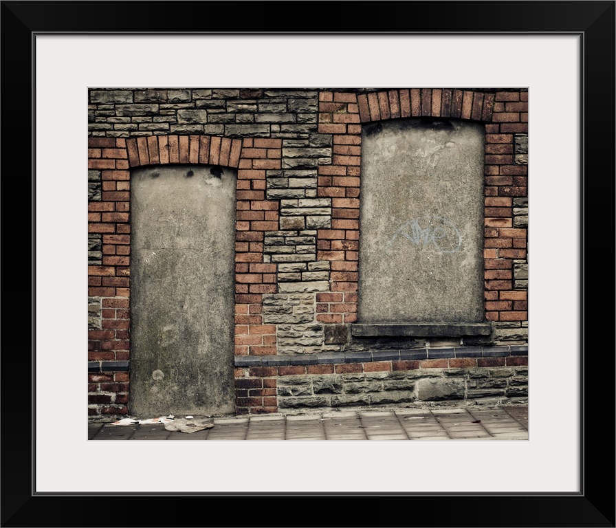 Concreted in derelict doorway and window