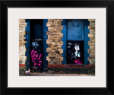 Derelict door and window with graffiti