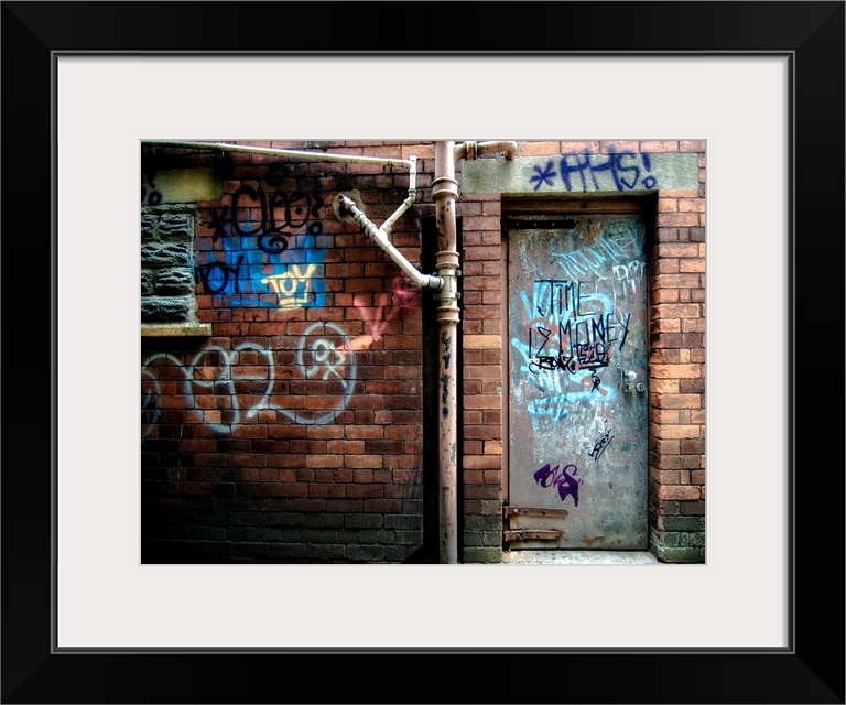 Derelict door with graffiti