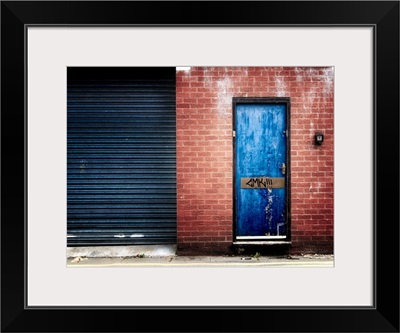 Derelict door with graffiti