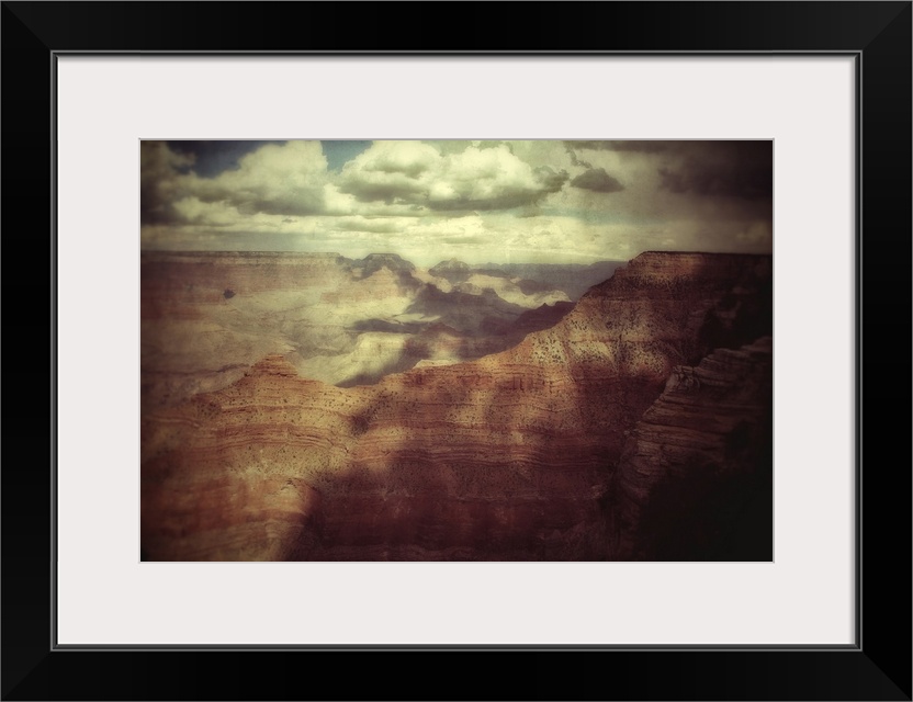 Huge canyon looking across the Grand Canyon in USA in a blue summer sky with texture layer
