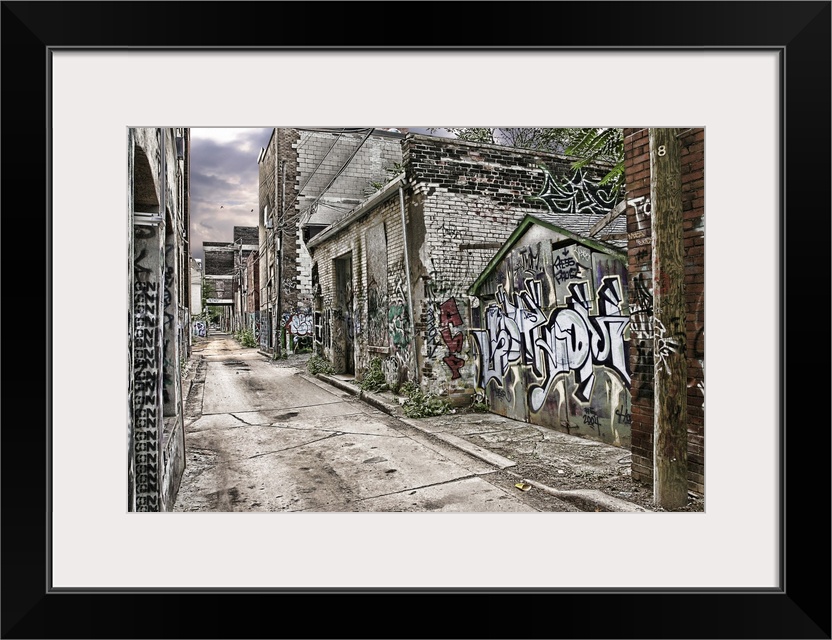 A back alley with graffiti