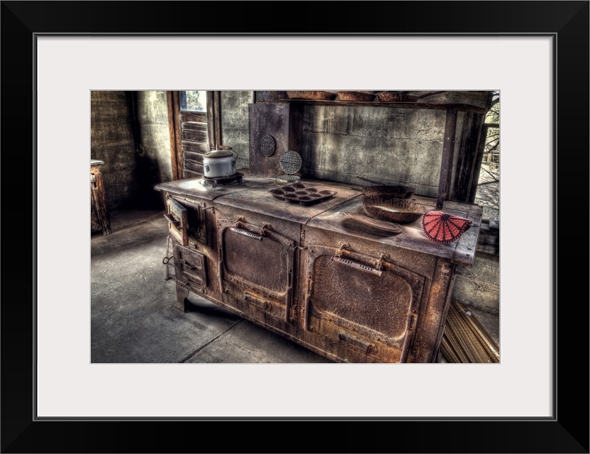 An old, rusty cook stove found in the gold mine kitchen.