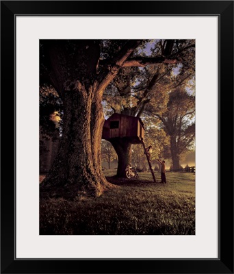 Two kids play on a treehouse on a rural farm in North Carolina