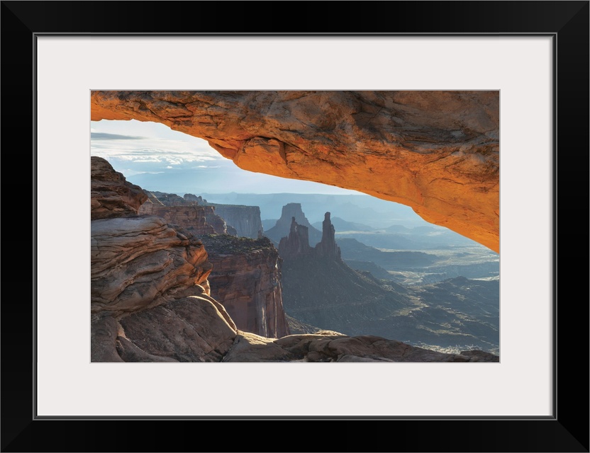 Mesa Arch Canyonlands National Park Washer Woman Arch, Monster and Airport Towers are in the distance.