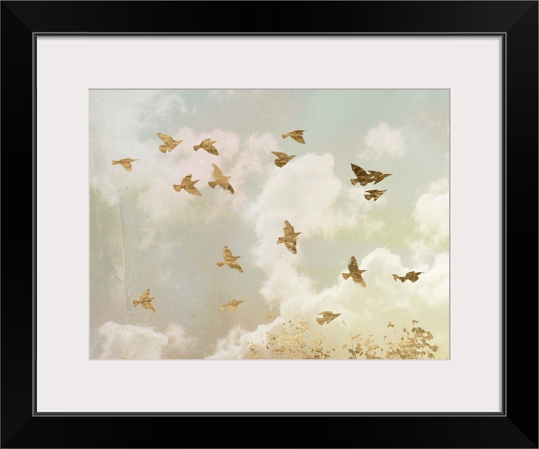 Gold birds in flight in a cloudy sky with bright sunlight.