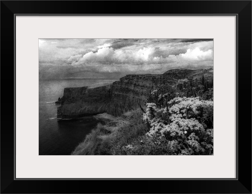 Fine art photo of cliffs on the Irish coast under a stormy sky.