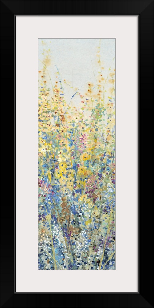 Vertical panel of blooming yellow and blue wildflowers in a field.