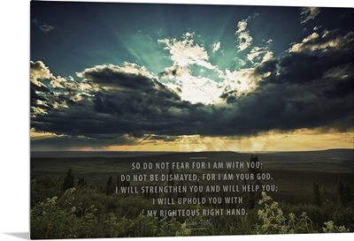 Sunset Shining Through Dark Clouds Over A Landscape And Scripture From Isaiah 41:10