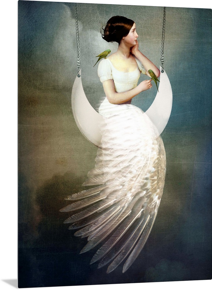 A conceptual portrait of a female with a feather dress sitting on a moon swing.