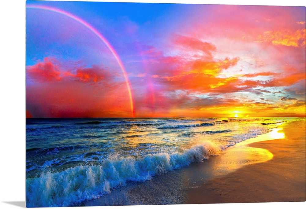 A beautiful colorful pink rainbow and sunset over ocean waves of a sandy beach. The colors and light of the beautiful suns...