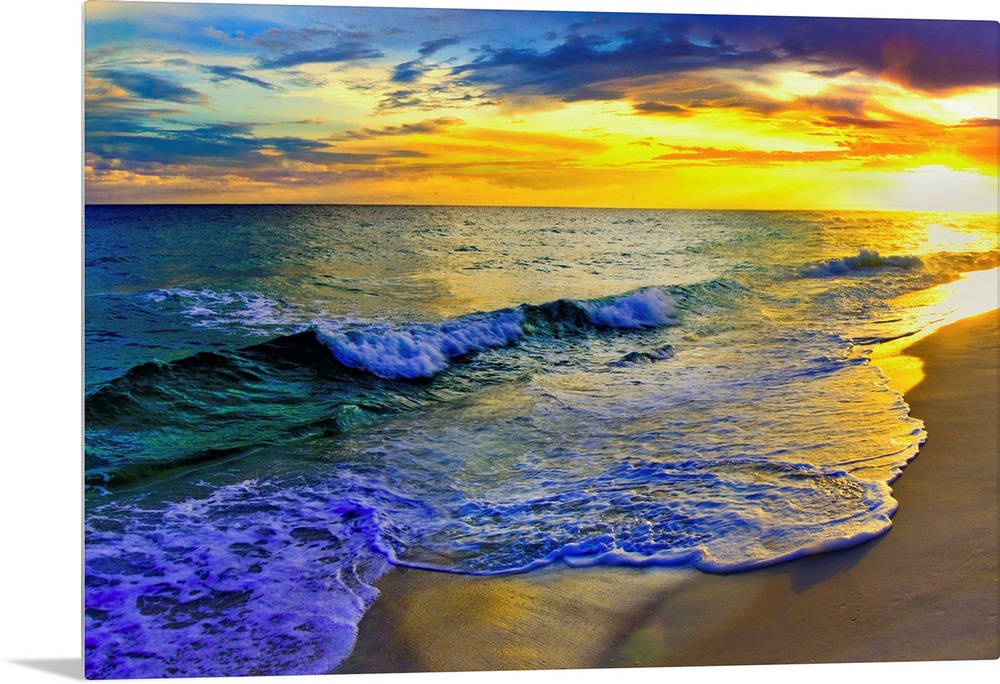 Image of waves rolling over Navarre beach before a dark yellow sunset seascape. Landscape taken on Navarre Beach, Florida.