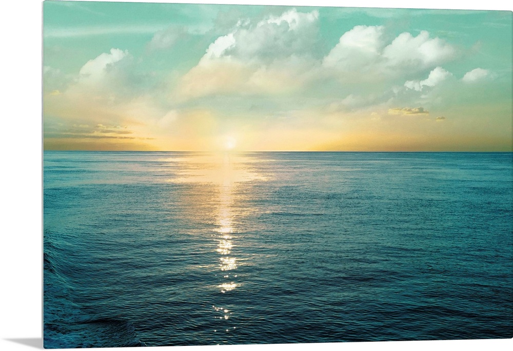 A photo of a solace sunrise glimmering on the ocean as it ascends to the sky.