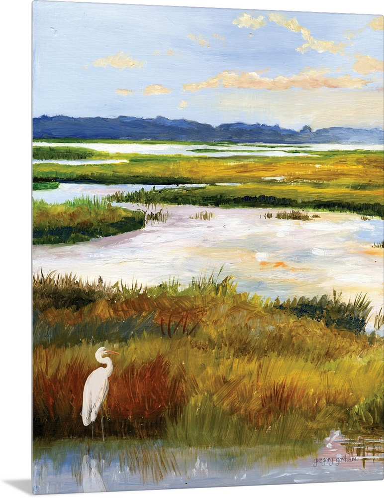 A serene scene of water and grasses illuminated by the late afternoon sun. A white heron stands patiently in the corner. T...