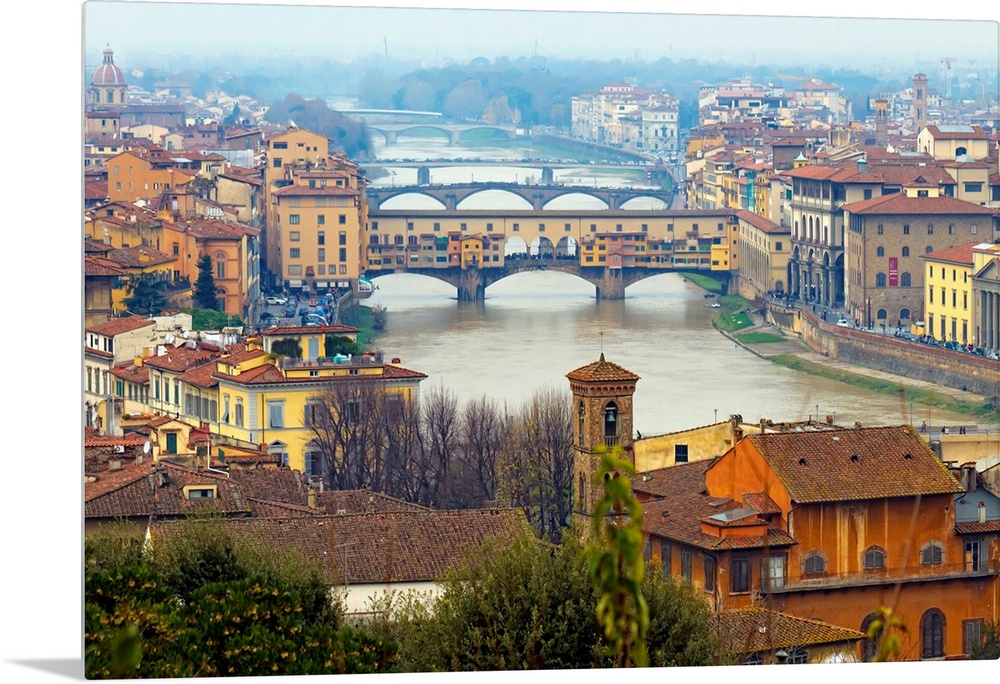 Giant photograph overlooking the Fiume Arno surrounded by a busy city within Italy.  On the shores of the river, the build...