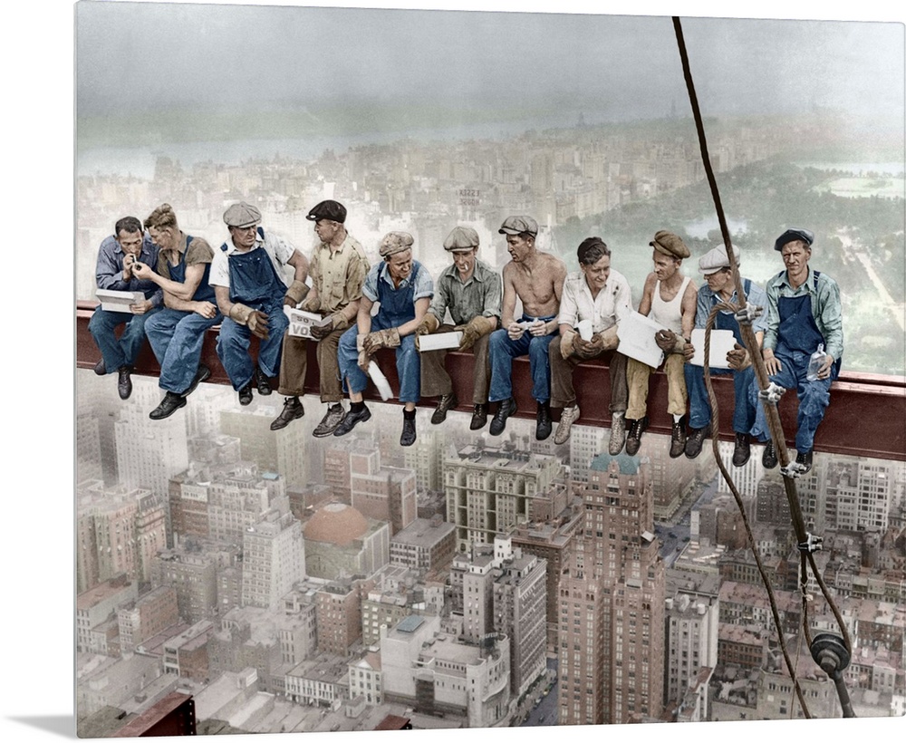 29 Sep 1932, Manhattan, New York City, New York State, USA --- Construction workers eat their lunches atop a steel beam 80...