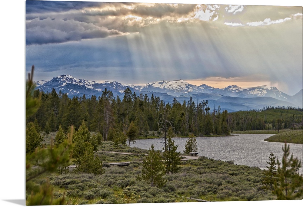 Sun rays filtering through clouds.