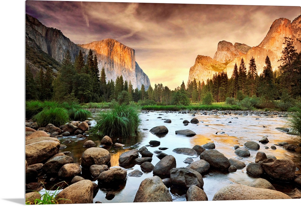 A landscape photograph taken from the valley floor of this national park as the sun illuminates the famous rock faces of t...