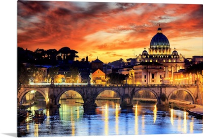 Italy, Rome, St. Peter Basilica by night reflecting on Tevere river