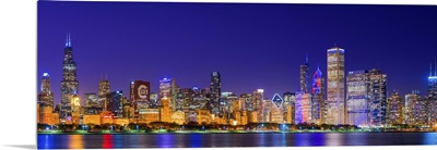 Chicago skyline with Cubs World Series lights night