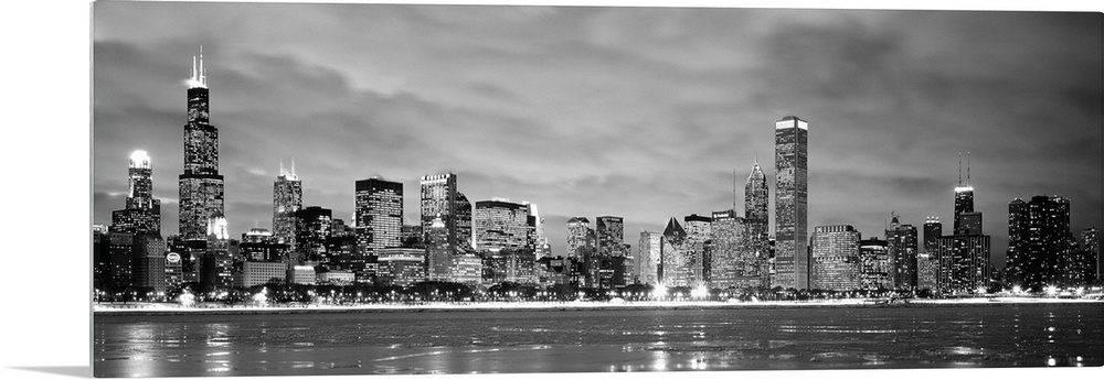 Black and White panoramic photograph showing the view from Lake Michigan in winter of the Chicago skyline of the downtown ...