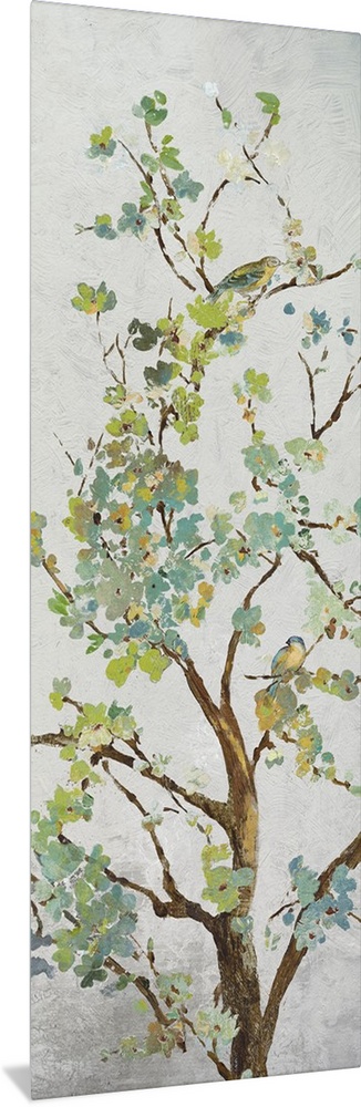 Tree branch with light green leaves on grey.