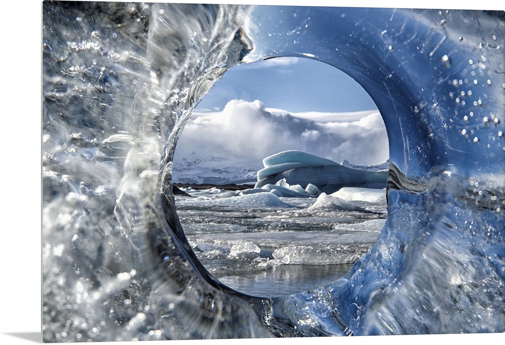 Looking through a hole of ice from a glacier.