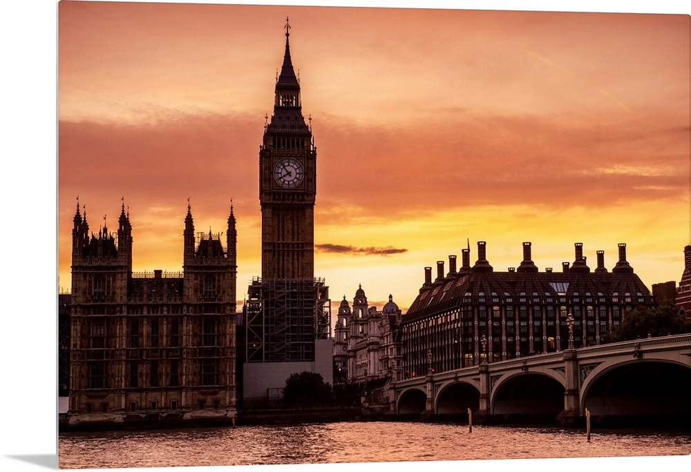 View of Big Ben and Westminster Bridge at sunset in London, England.