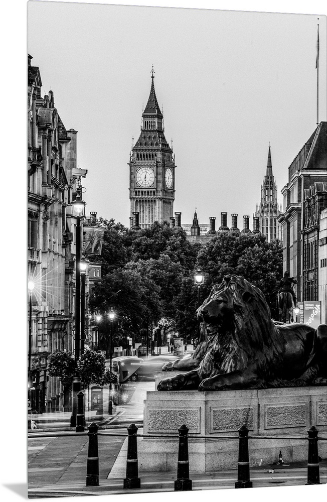 Black and white photograph of Trafalgar Square with the iconic Trafalgar Lions in the foreground and Big Ben in the backgr...