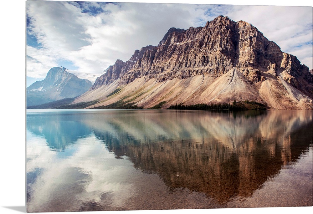 Crowfoot Mountain reflected in Bow Lake located in Banff National Park, Alberta, Canada.
