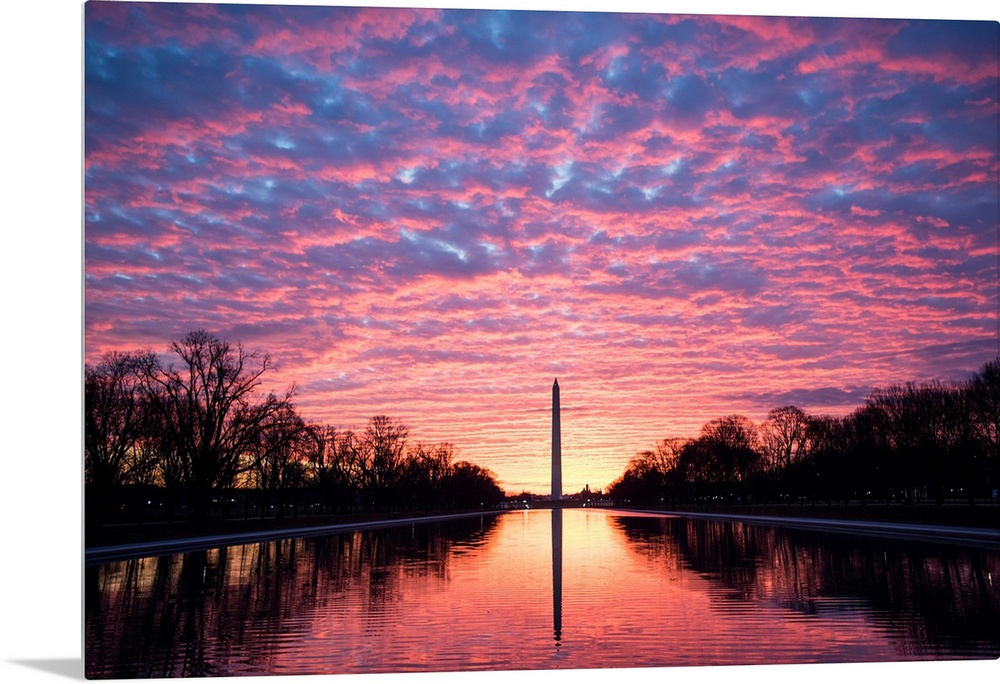 Vibrant clouds at sunset over the Washington Monument on the National Mall in Washington, DC.