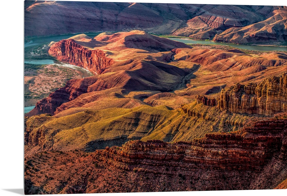 Landscape photograph of the Colorado River winding through the Grand Canyon.