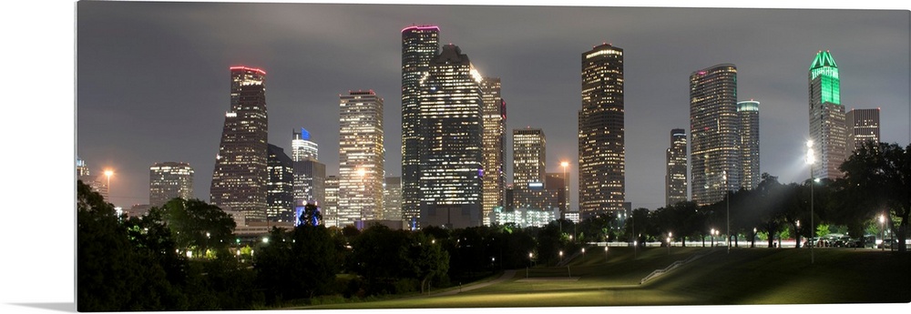 Panoramic photograph of the Houston TX skyline at night from Eleanor Tinsley Park.