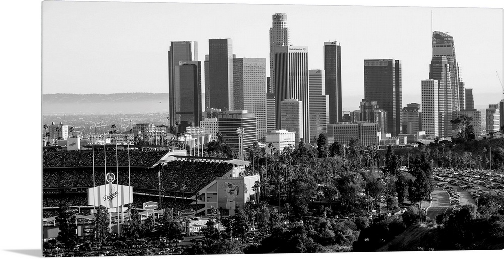 Photograph of the downtown Los Angeles skyline with Dodger Stadium on the left.