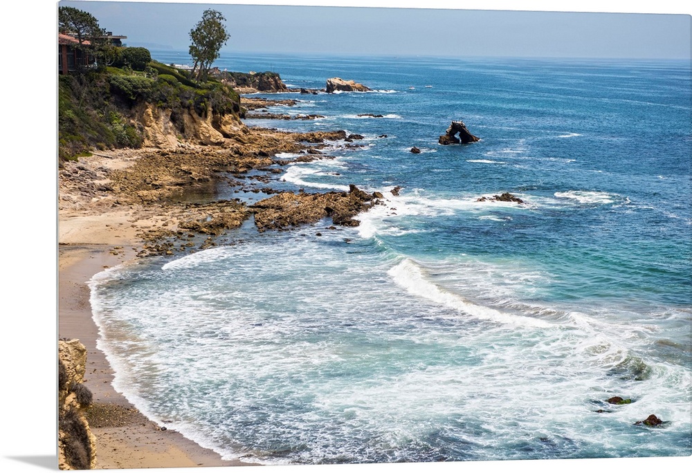 Little Corona del Mar beach is relatively small, flanked on both sides with rocky reefs.