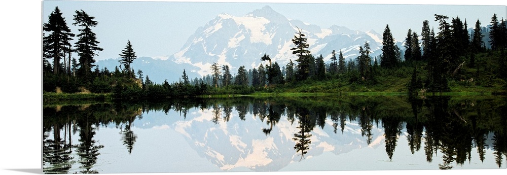 Panoramic photograph of Mt. Shuksan reflecting into Picture Lake around sunset.