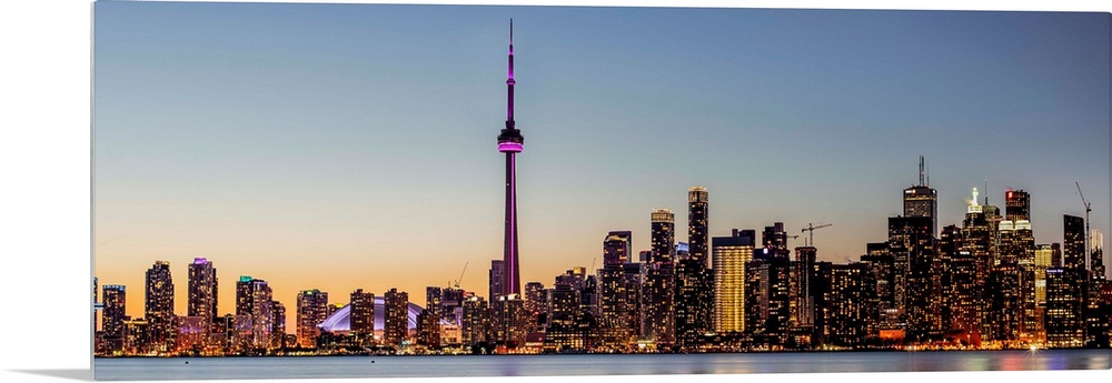 Photo of Toronto city skyline at night, Ontario, Canada.