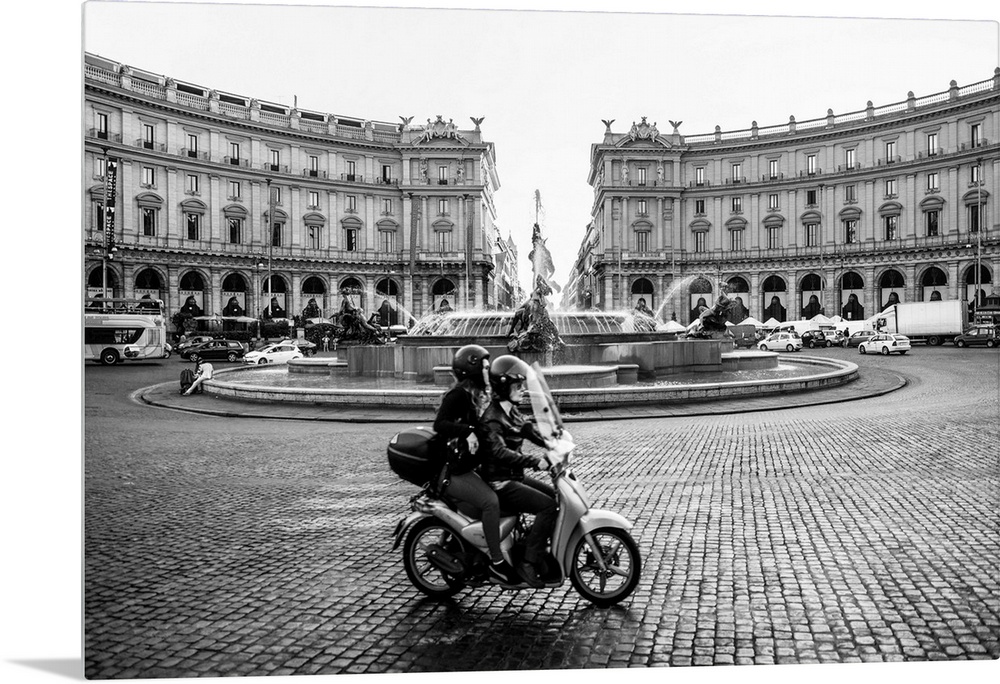 Photograph of the Piazza della Repubblica with the Fountain Of The Naiads and a couple on a motorbike in the foreground, F...