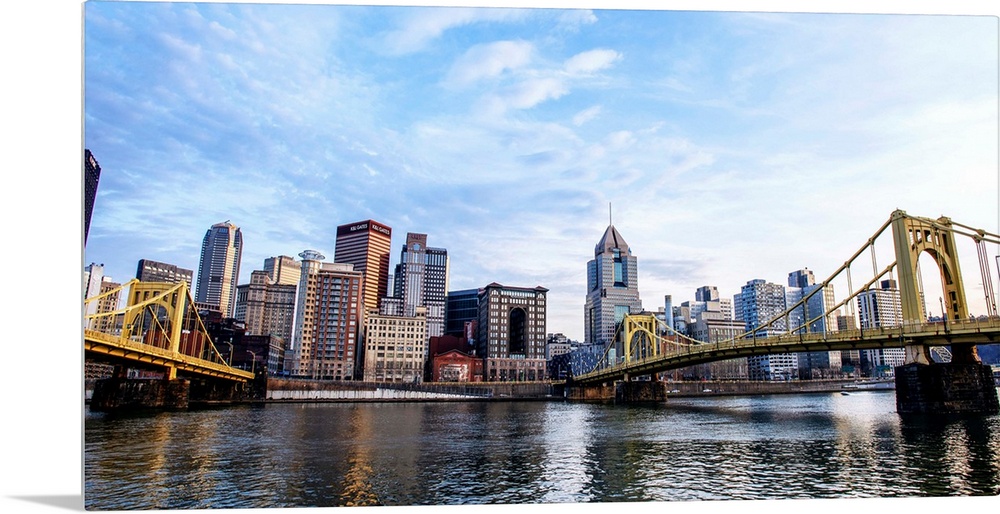 Photo of downtown Pittsburgh with Roberto Clemente Bridge over the Allegheny River.