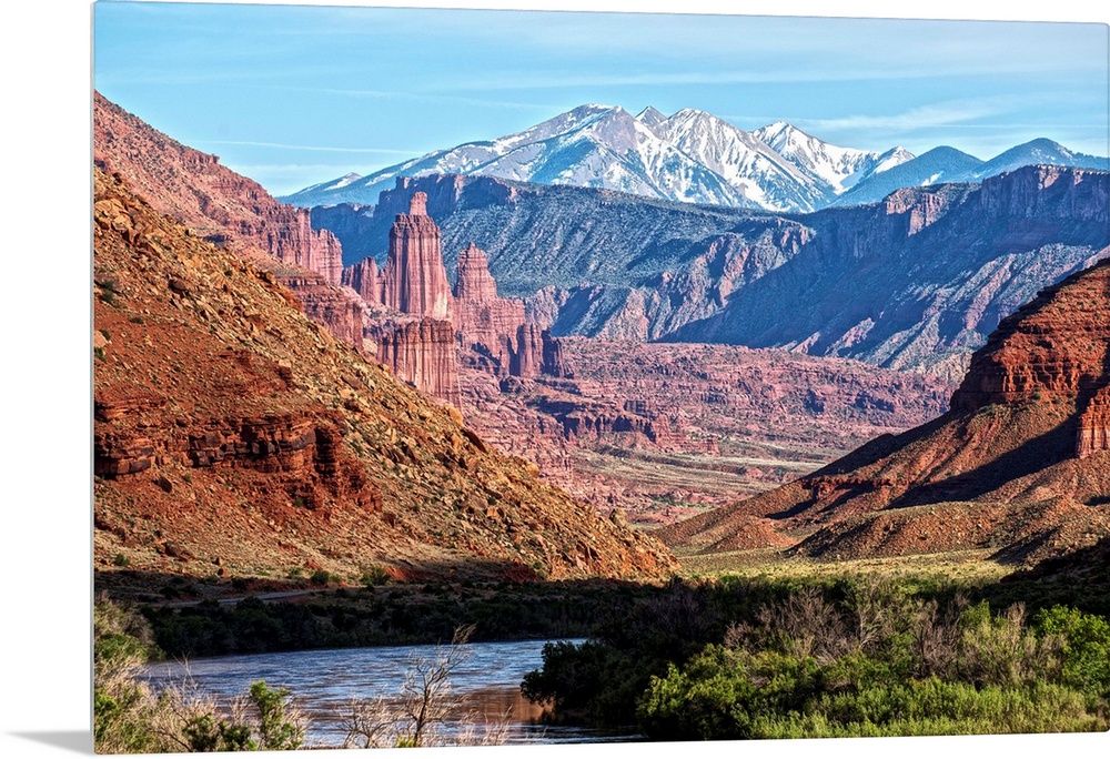 A river running through the Salt Valley of Arches National Park, with a view of the Fiery Furnace and the La Sal Mountains...