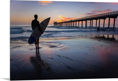 Scripps Beach Pier and Surfer Silhouette at Sunset, La Jolla, San Diego