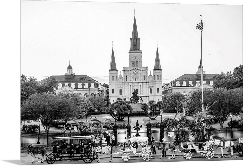 View of carriages stand in front of St. Louis Cathedral and Jackson Square in New Orleans, Louisiana.