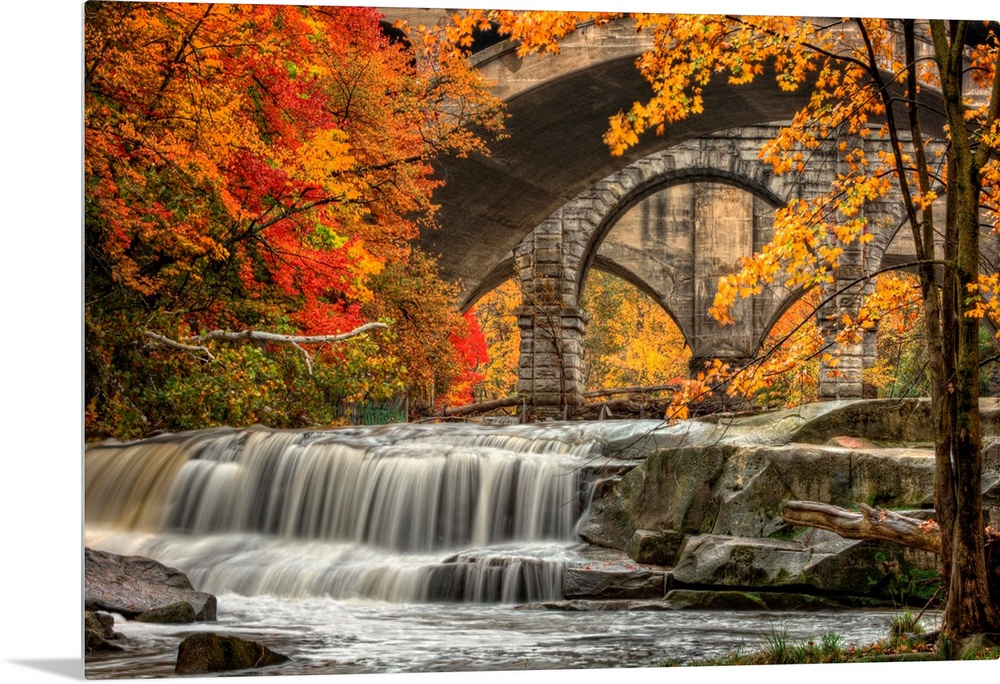 Berea Falls, Ohio, during peak fall colors. This cascading waterfall looks it's best with peak autumn colors in the trees....