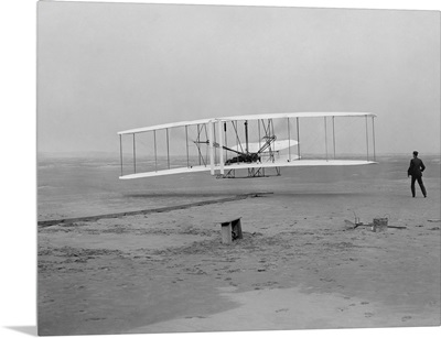 The first flight of the Wright Flyer in 1903