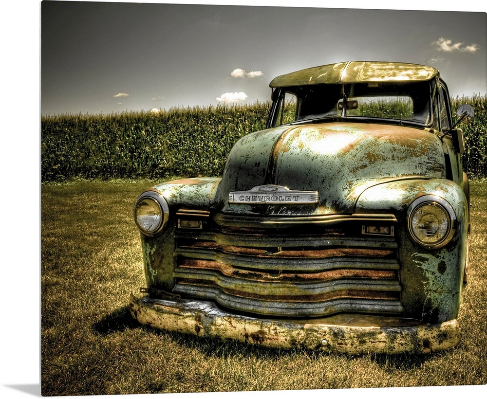 A photo on canvas of a vintage Chevrolet truck parked in front of a corn field.