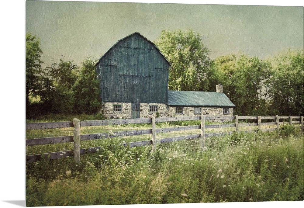 A photograph of a blue barn.