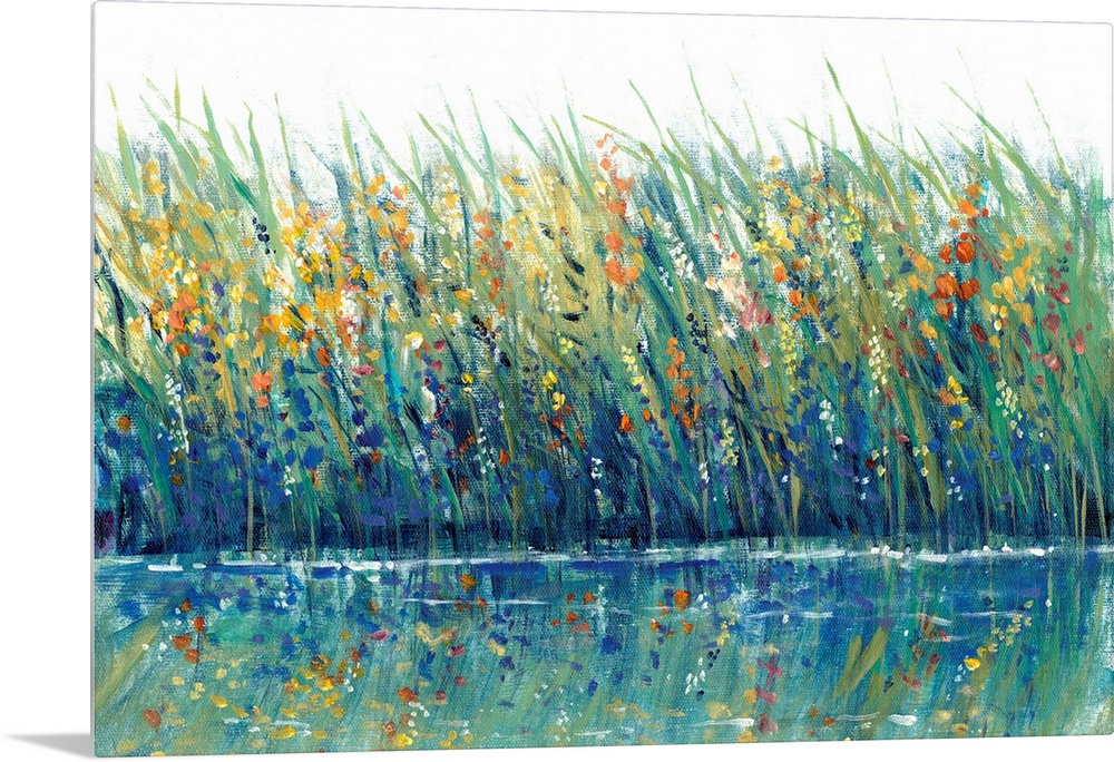 A mass of grasses and reeds interspersed with wild flowers on the edge of a lake or pond; the flowers are reflected in the...
