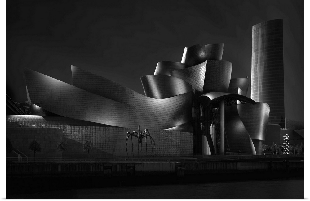 Black and white image of the interesting architecture of the Guggenheim museum in Bilbao, Spain.