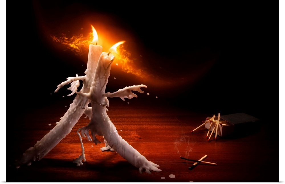 Conceptual image of two lit candles dancing with melting wax.